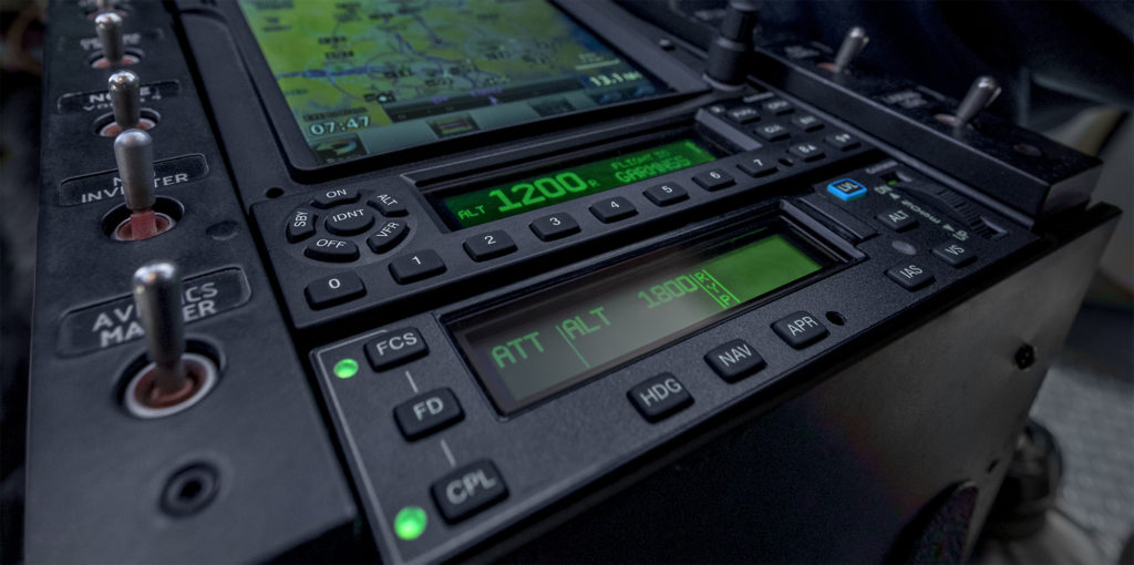 Stack in helicopter featuring mode controller, transponder and navigator