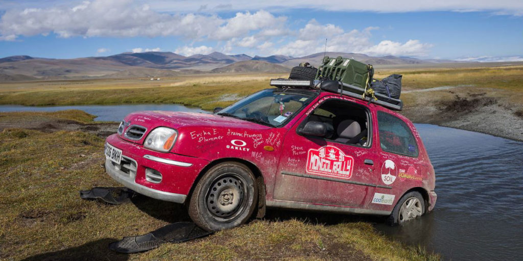 Scott Gurian and Drew Gurian's Mongol Rally car in river