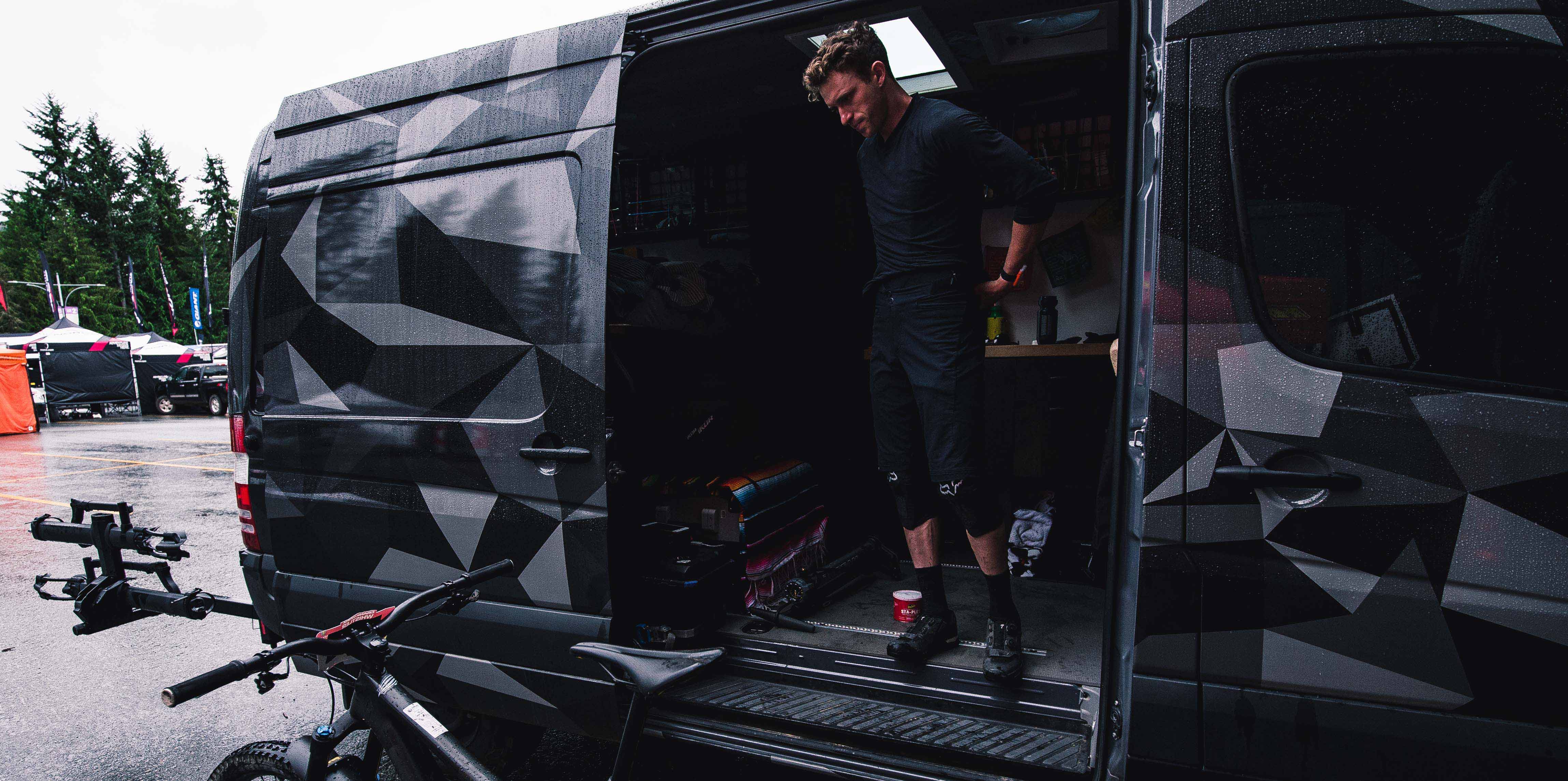 Garmin Ambassador Jimmy Smith standing in his van before his mountain biking competition