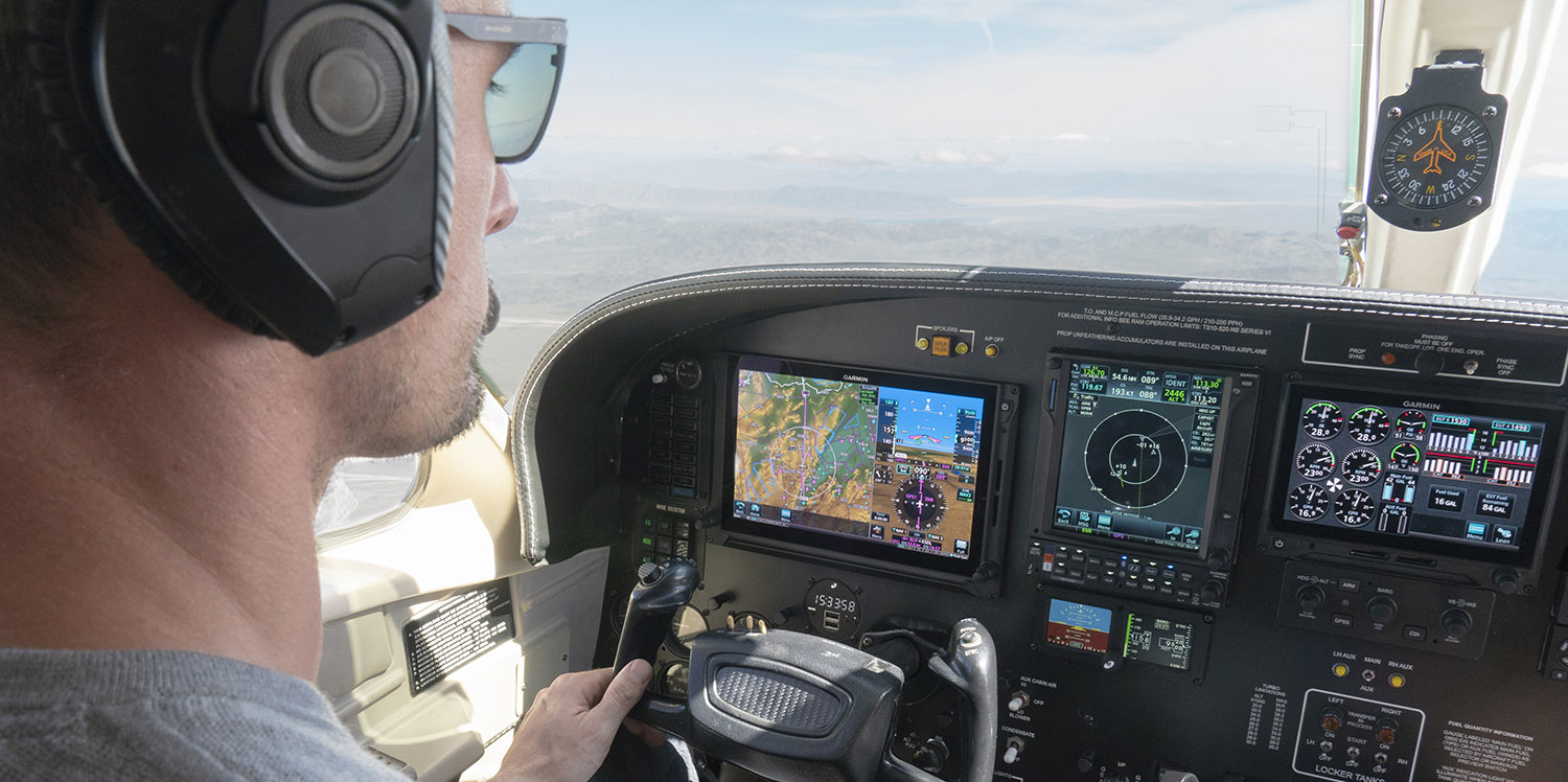 airplane cockpit with pilot flying