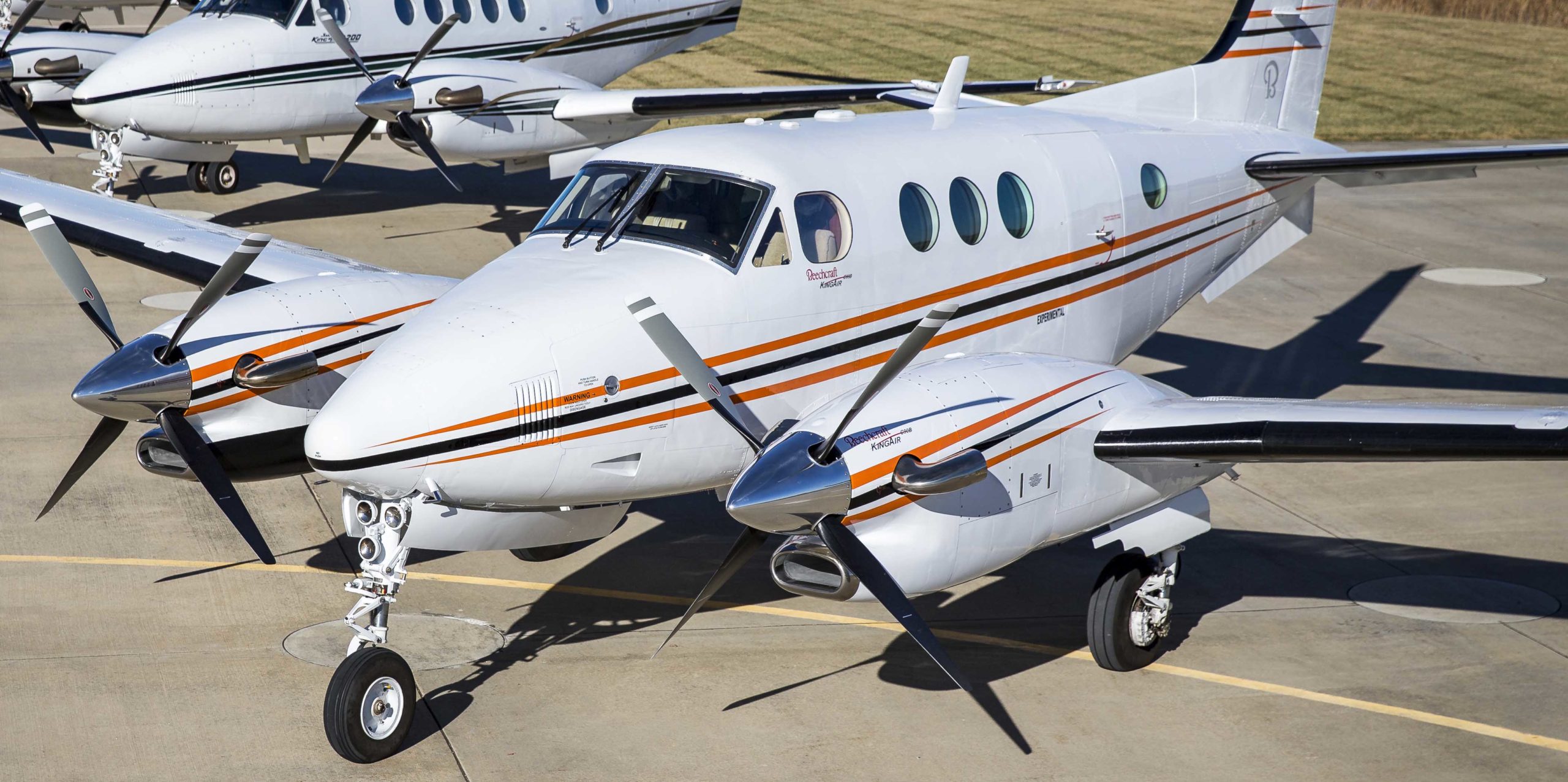 King Air aircraft parked on a taxiway ramp