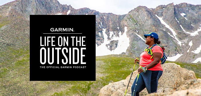 Garmin Ambassador Mirna Valerio standing on a mountain; copy overlay reads "Garmin Life On the Outside the official Garmin Podcast""