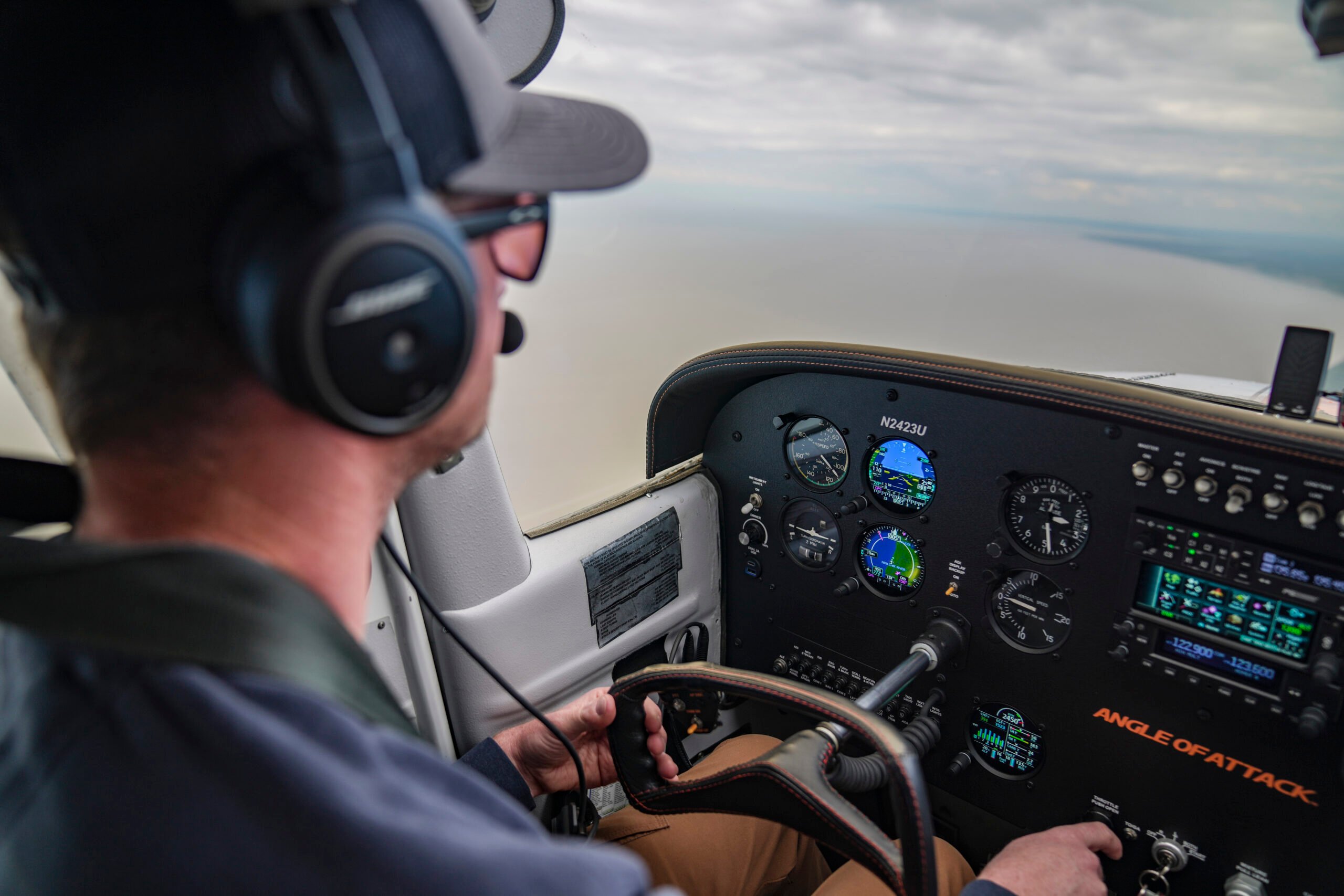Pilot in flight deck with iPad