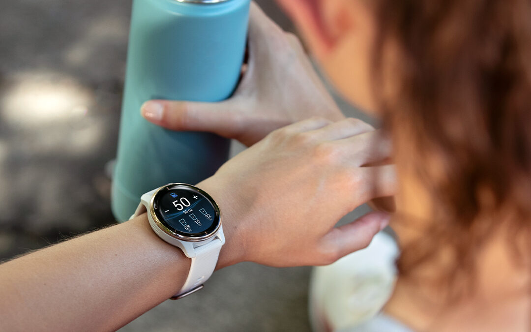 Water inname bijhouden met een Garmin smartwatch tijdens fitness. 