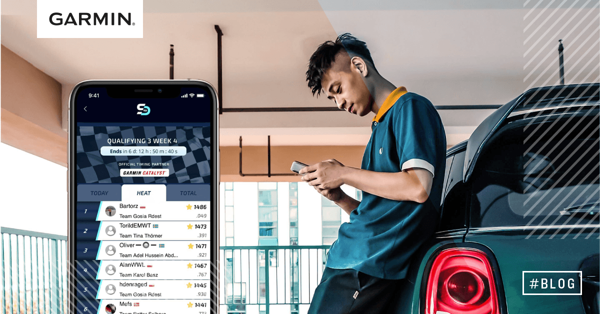 Man met telefoon in handen FIA Smart Driving